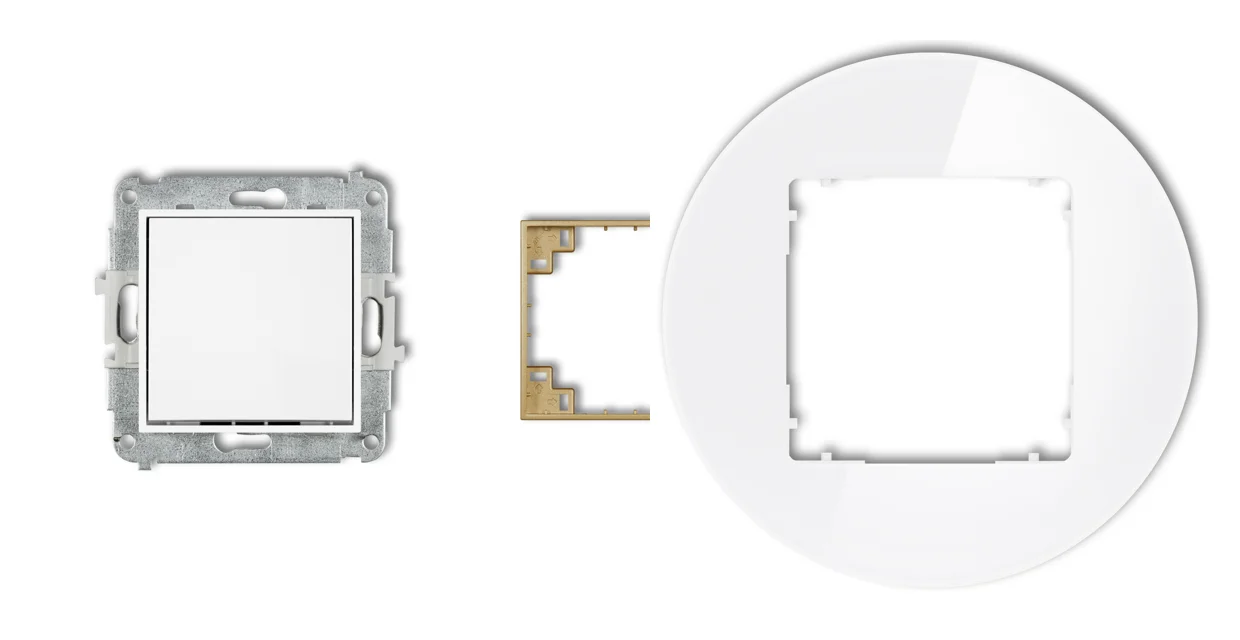 The three parts of an ICON switch: mechanism, gold intermediate frame and round glass-effect frame